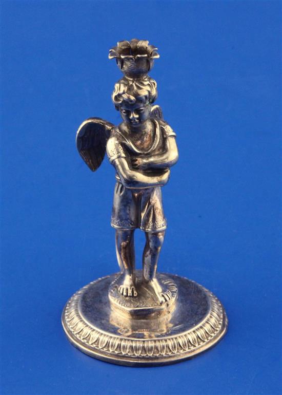 A late 19th century continental silver figural taperstick, 3.5 oz.